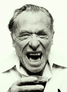 Bukowski smiling and drinking 