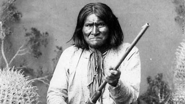 Geronimo posing with a rifle