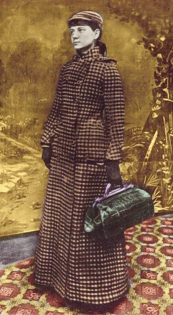 Journalist Nellie Bly stands with suitcase in hand.