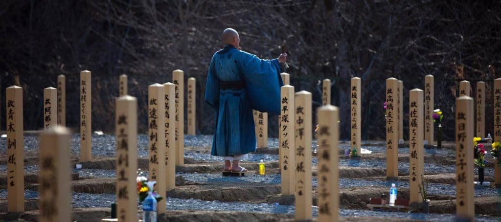 A traditional shinto ritual in a graveyard
