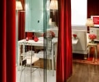 hotel vanity bathroom with velvet curtains
