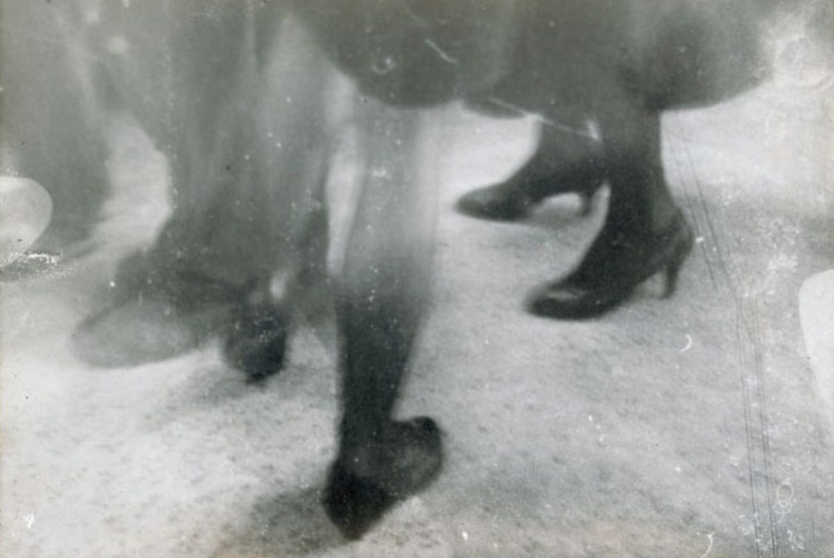 Feet on street photograph by Miroslav Tichý