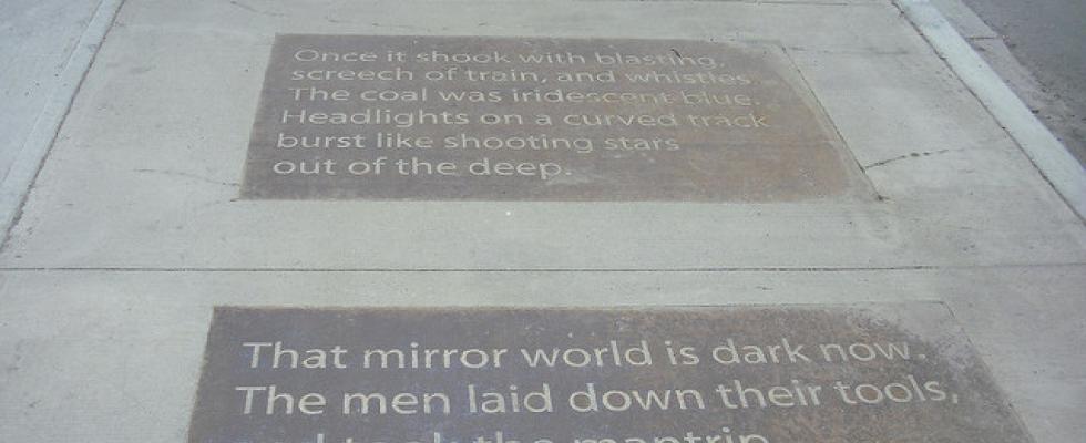 Poetry on Boston sidewalk only visible when wet