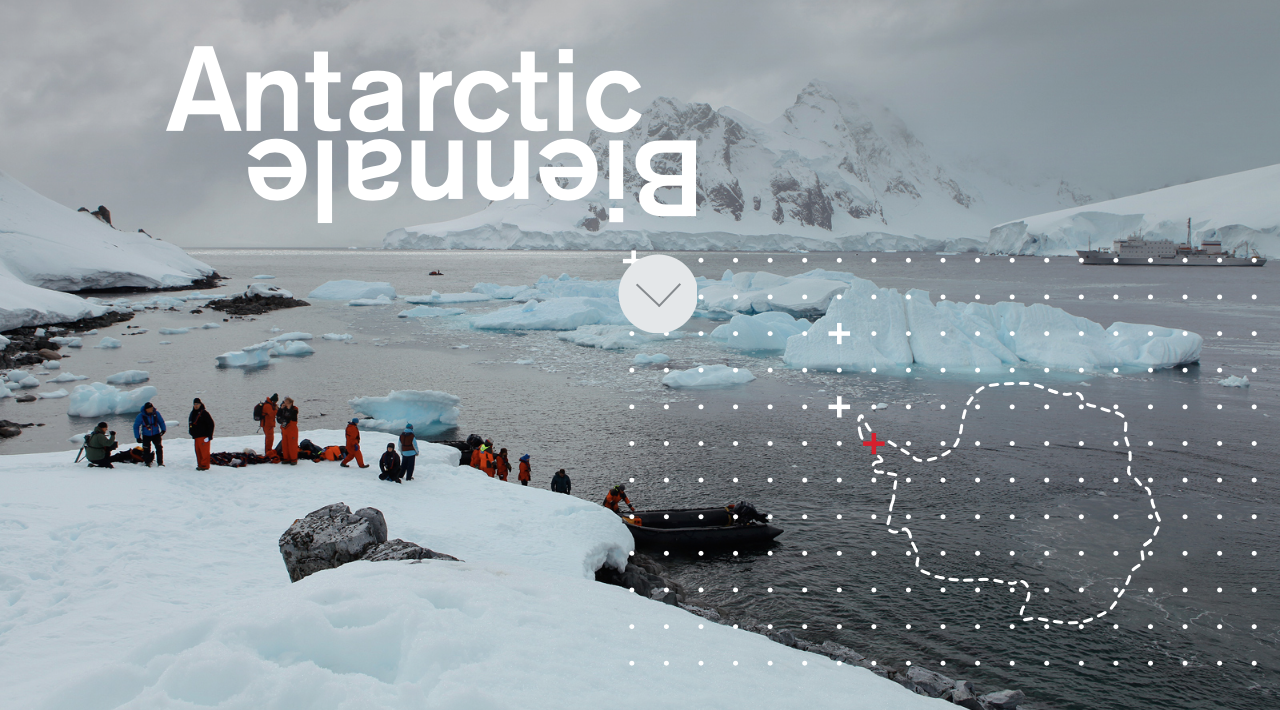 Explorers on an iceberg in Antarctica. 