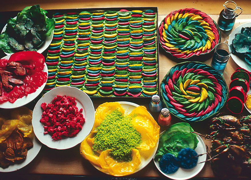 Brightly colored food sliced on a platter.