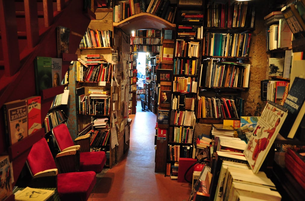 interior of bookstore with velvet chairs