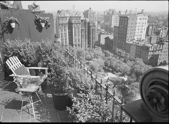 Black and white photo of a penthouse balcony. 