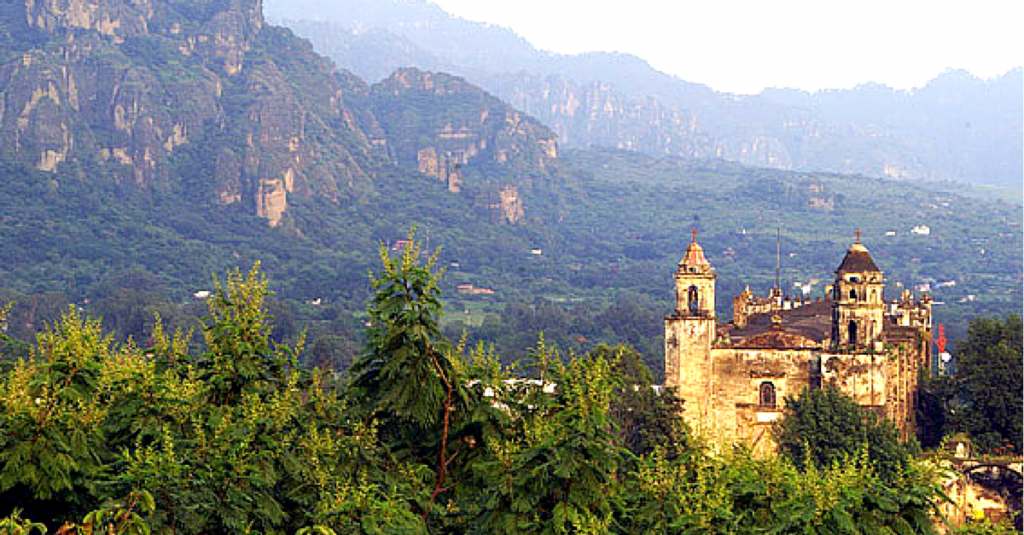 Tepoztlan with green, grass covered mountains in the background