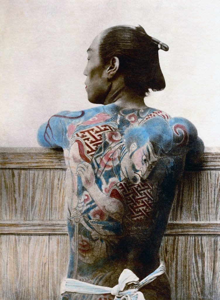 A Samurai warrior showing his intricate back tattoo 
