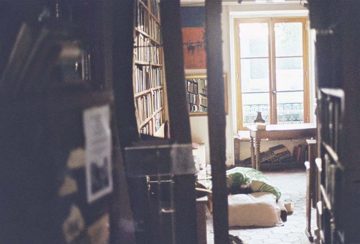 Woman sleeping on the floor of a library