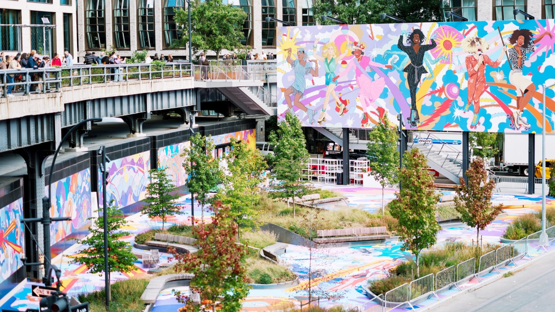 Colorful outdoor art installation at Faena New York in West Chelsea, featuring vibrant murals, landscaped gardens, and the High Line.