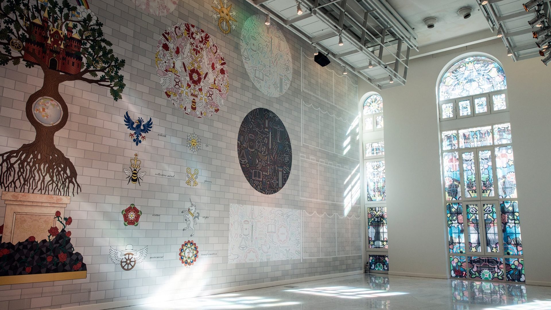 Faena Art Center large room with stained glass windows