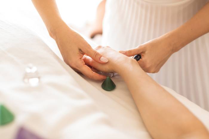 woman getting hand massage