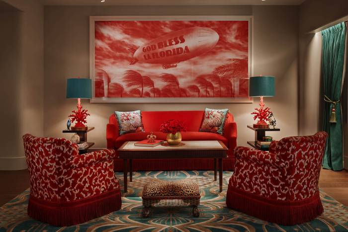 living room in hotel suite with large red painting