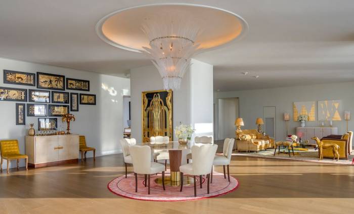 hotel penthouse open space with dining and living areas