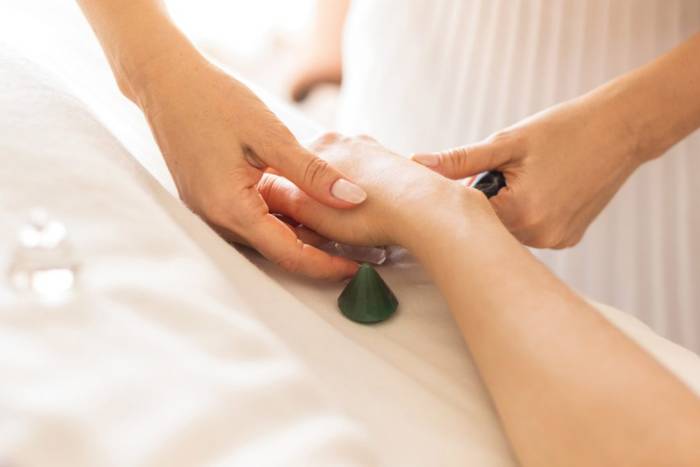 Woman getting hand massage