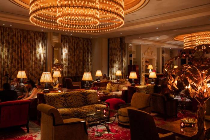 Dimly lit lounge area with couches