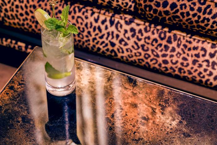 Fancy cocktail served at the Living Room at Faena