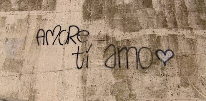 cement call with the words 'Amore ti amo' with a heart written on it
