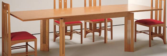Long wood dining table and chairs by Charles Mackintosh