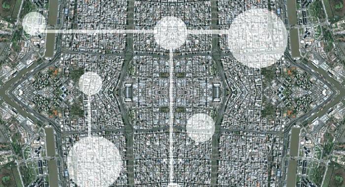 Mirrored aerial image of a city overlaid with white circles and lines.