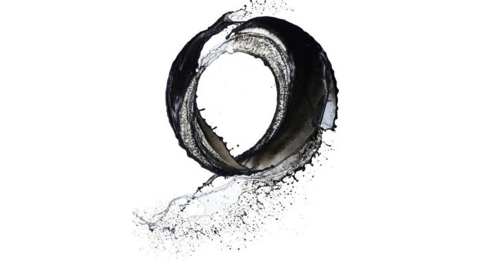 Black water whirling in a loop.