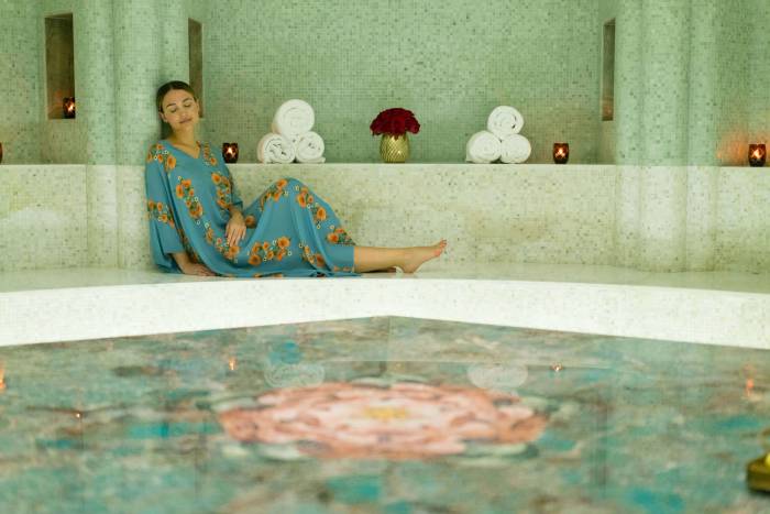 woman sitting in a spa relaxation room