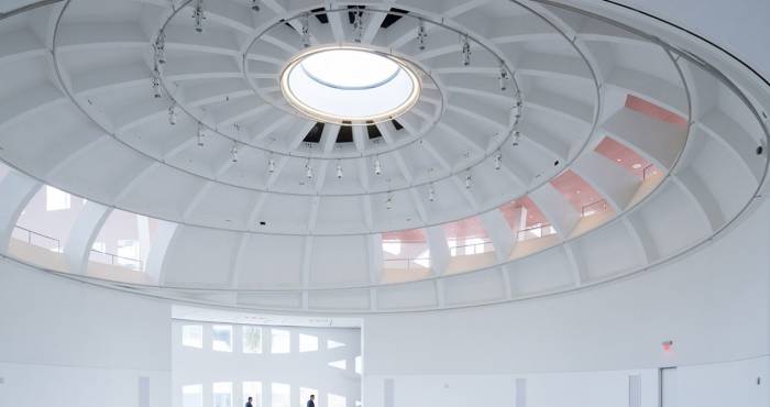 indoor ceiling shot of white sphere-shaped building