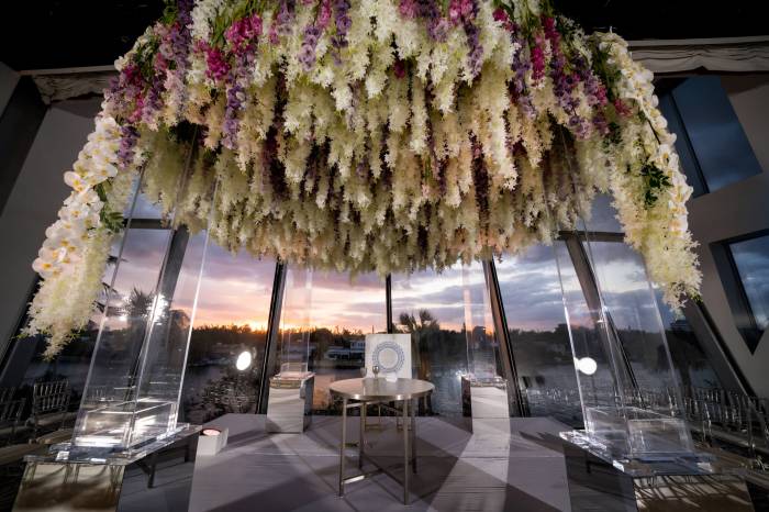 close up of floral wedding arch in Faena Forum