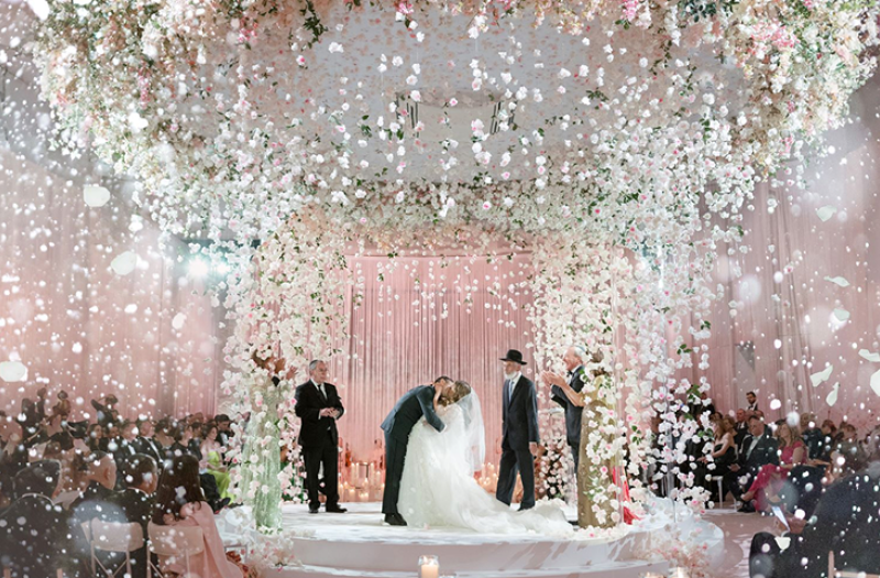A bride and groom kissing