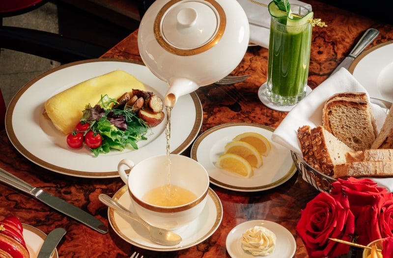 Tea being poured in room dining