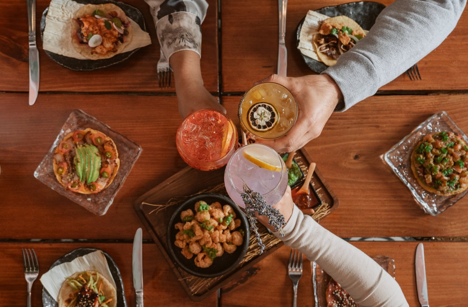 People holding their glasses