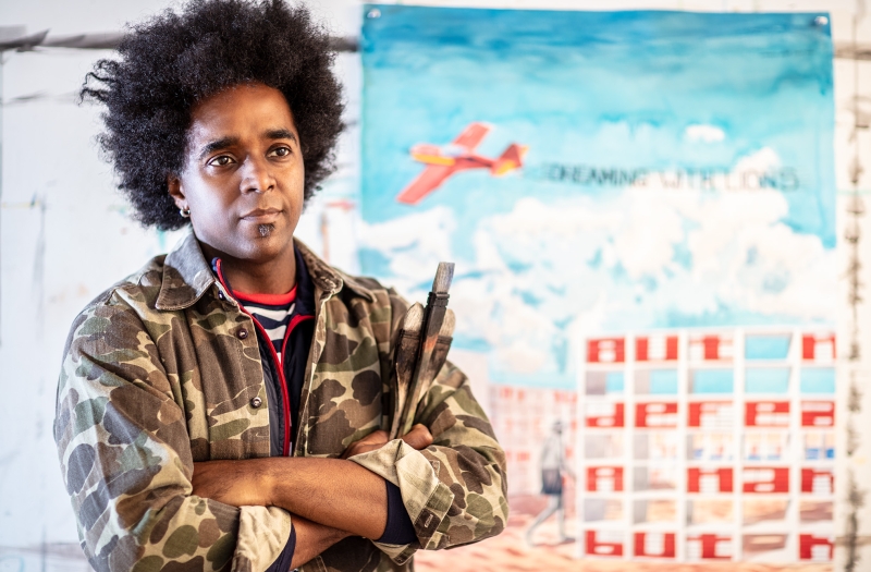 Alexandre Arrechea Cuban Artist with painting