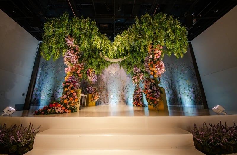 wedding arch made of floral and greenery