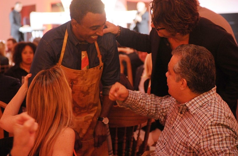 group of chefs and audience members chat amongst themselves