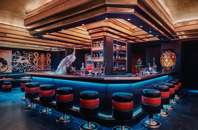 Saxony Bar with peacock on the bar