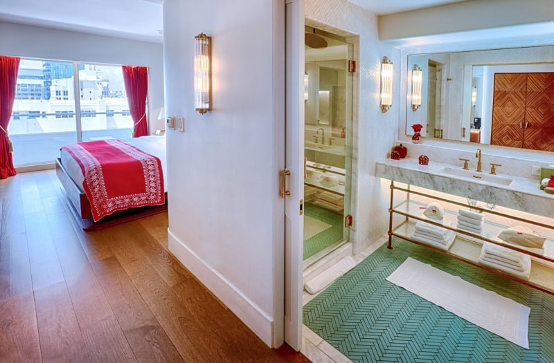 ocean view hotel room looking into bathroom 