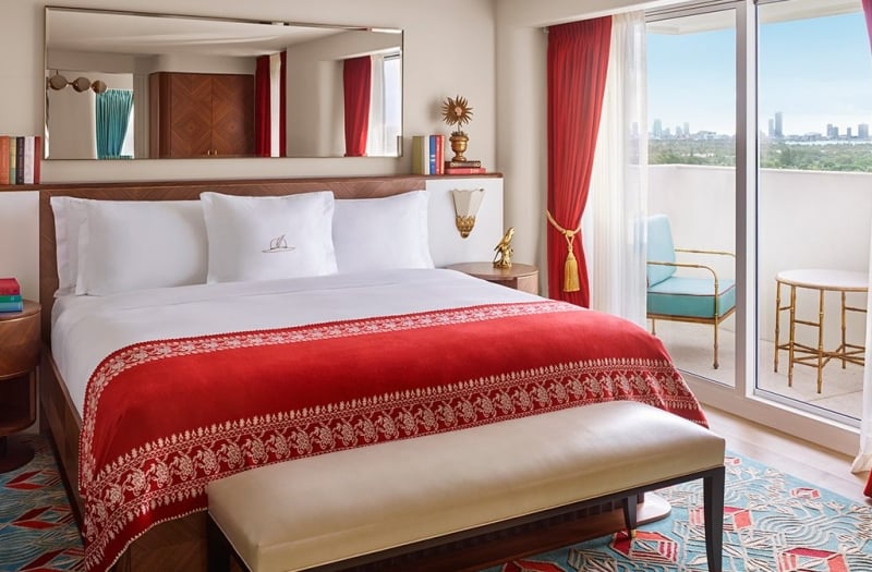 bedroom in hotel with balcony