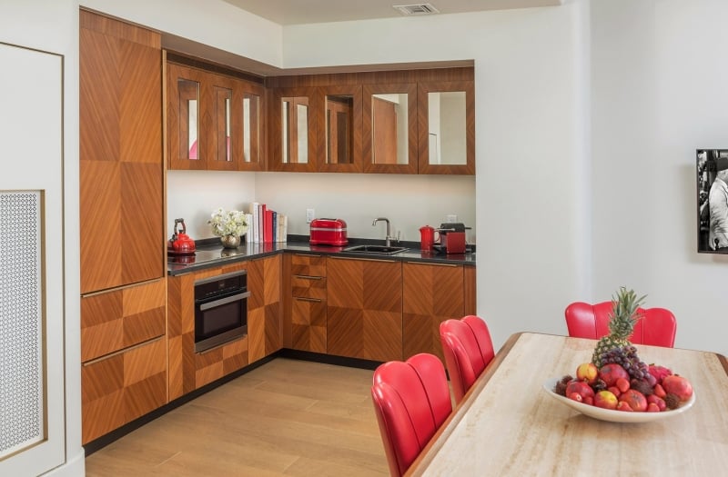Kitchen with wood paneled cupboards