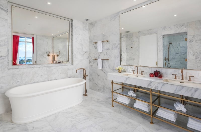 hotel bathroom with large stand alone bathtub