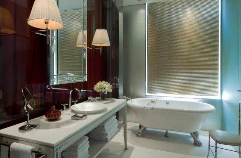 hotel bathroom with large stand alone bathtub