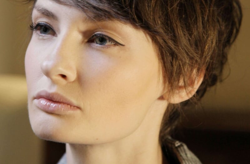 close up of a woman with a pixie cut