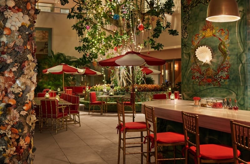 bar and dining seating next to the tree of life