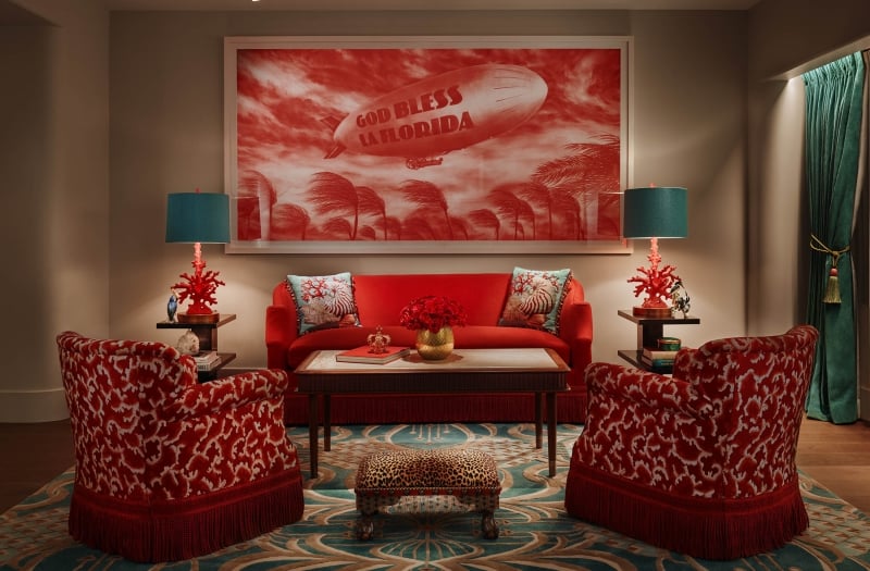 living room in hotel suite with large red painting