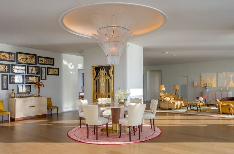 hotel penthouse open space with dining and living areas