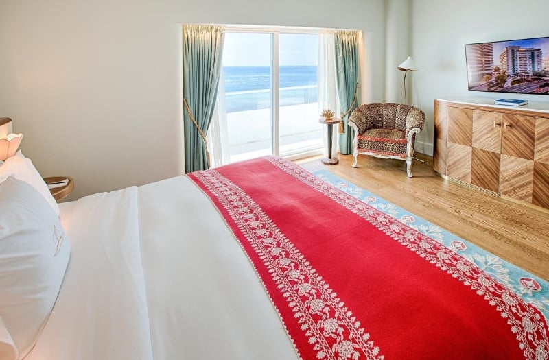faena suite hotel bedroom overlooking the beach
