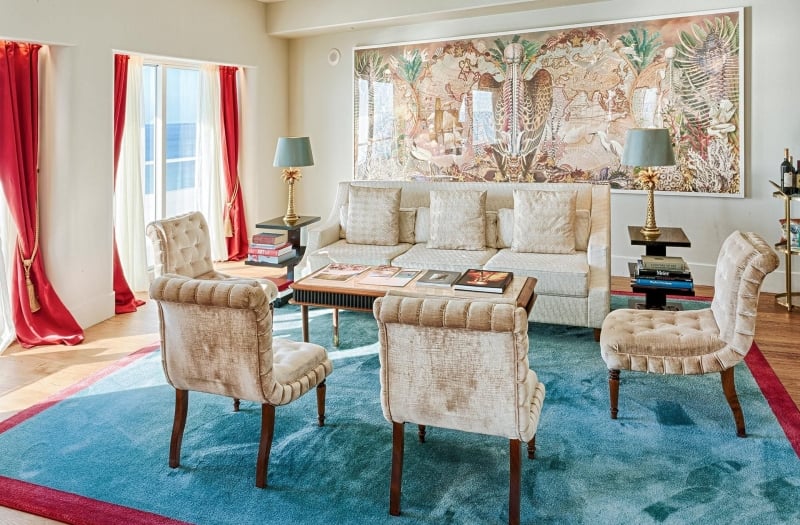 couch and four chairs in faena hotel suite
