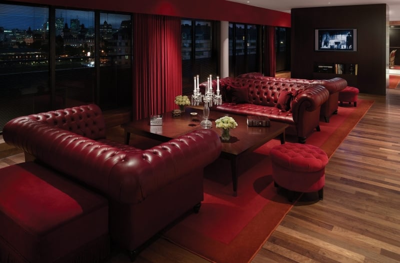 living room with leather couches in hotel suite