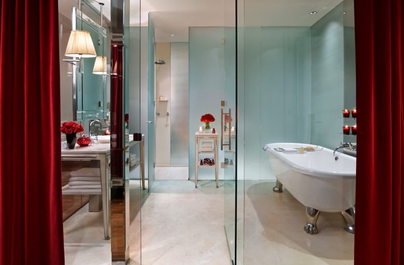 hotel bathroom with large stand alone bathtub