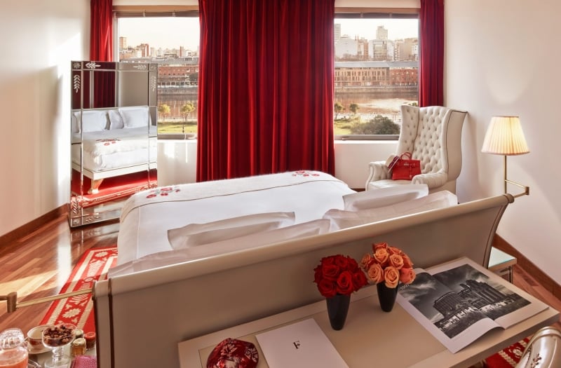 hotel bedroom with velvet curtains